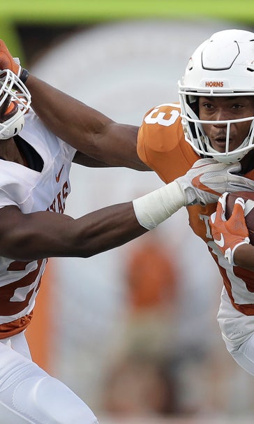 Once Texas' breakout QB, Heard quietly ending career as WR